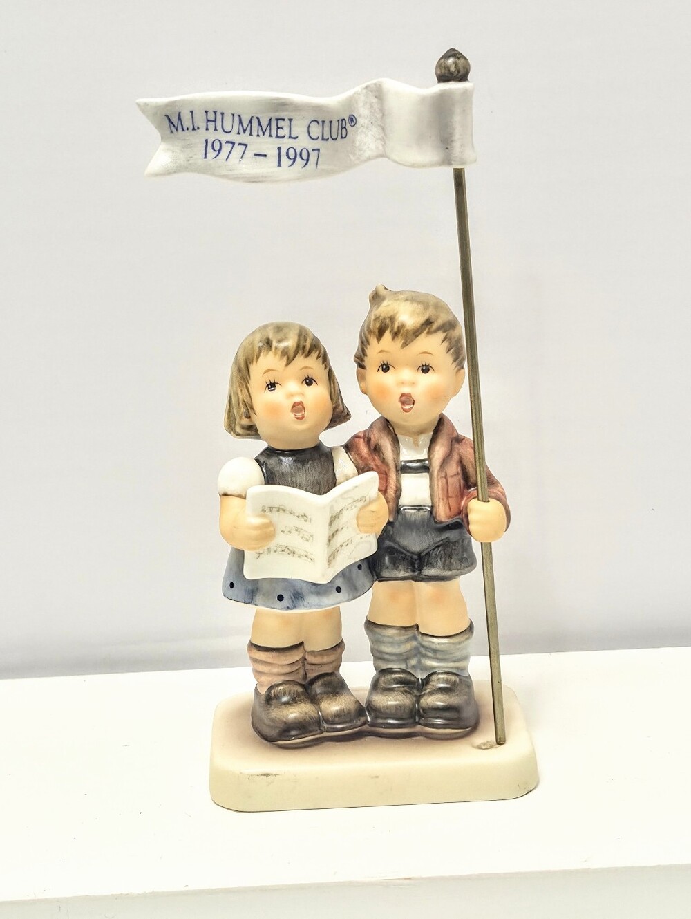 M. I Hummel #790 celebrate with song figurines